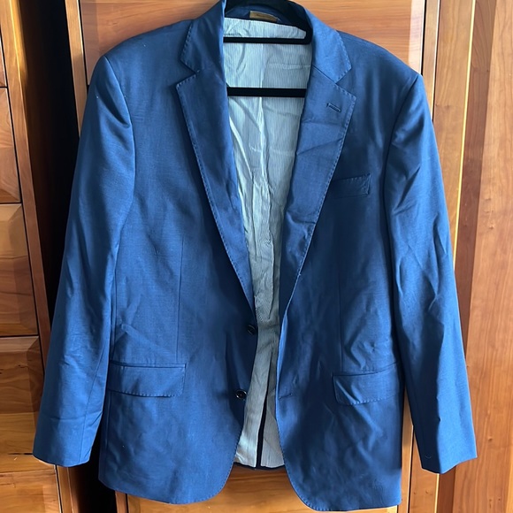 Brooks Brothers navy blue suit. Wool/poly blend. Jacket is 40L and pants 36/30